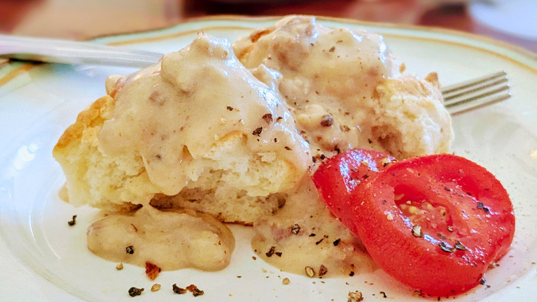 stacked cheddar cheese biscuits on dainty plate on baking tray