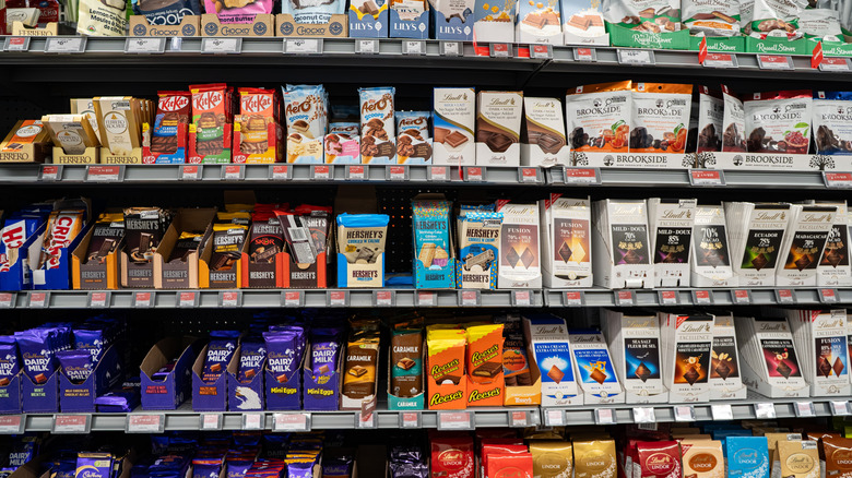 Chocolate bars on grocery store shelves