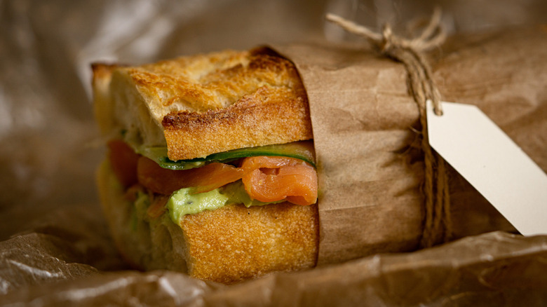 Close-up of wrapped baguette sandwich