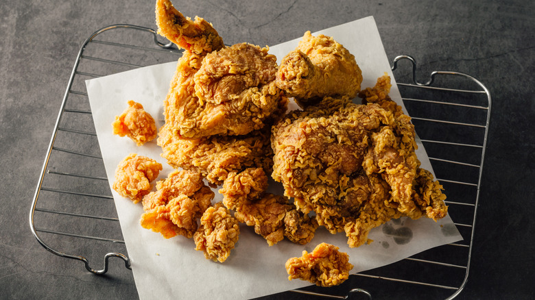 Fried chicken on top of a metal rack