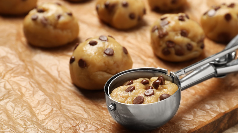 Chocolate chip cookie dough and scooper