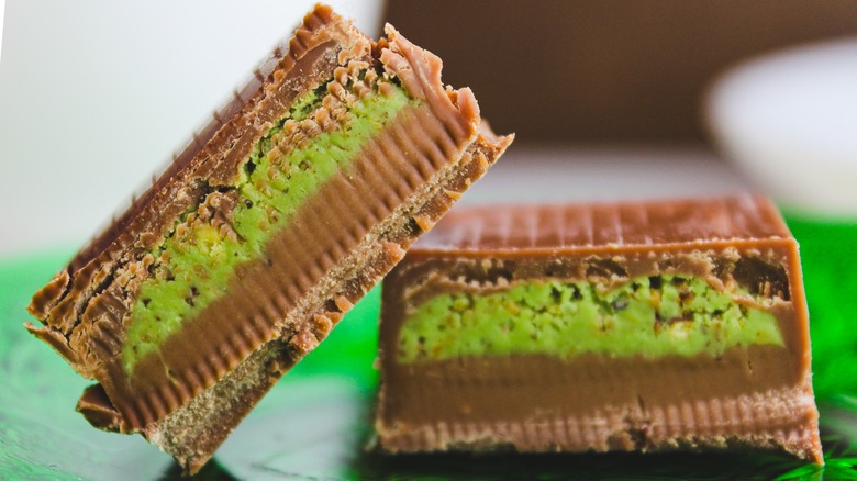 Dubai-style chocolate squares on a green plate