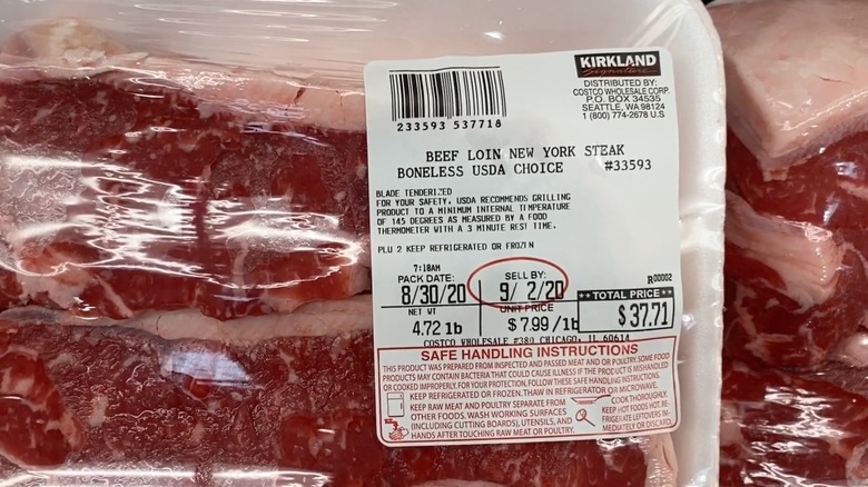 A Kirkland beef steak package with mandatory messaging about blade tenderization