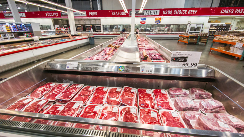 A refrigerated bin of Kirkland steaks in Costco
