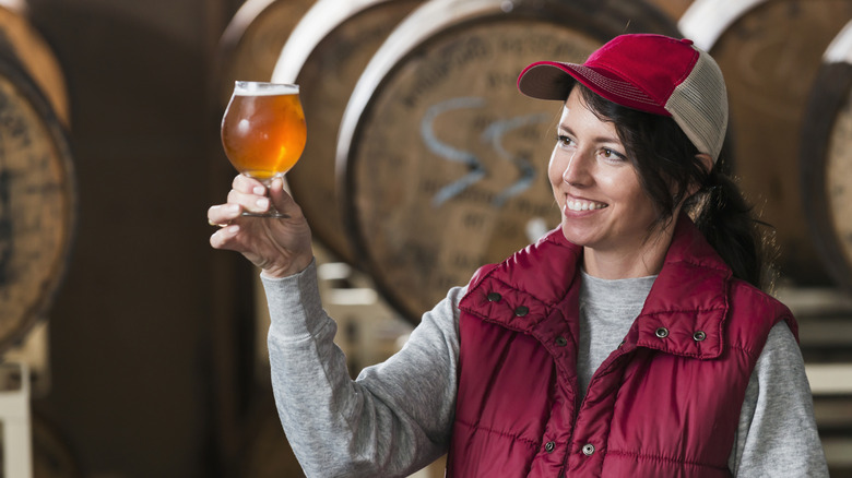 Brewer with a tulip glass of craft beer