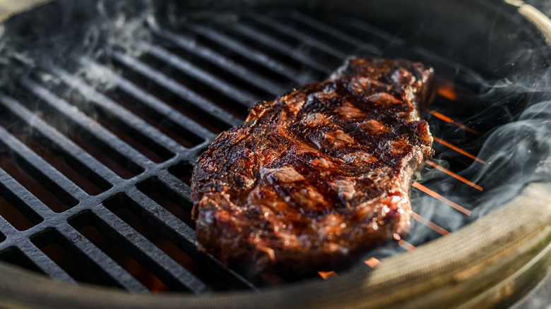 Rib-eye steak on grill