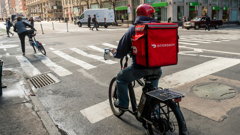 DoorDash employee on bike in city