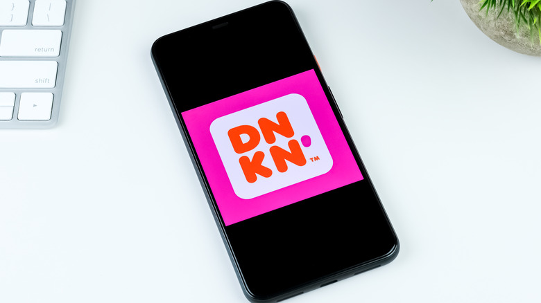 Dunkin' logo on smartphone