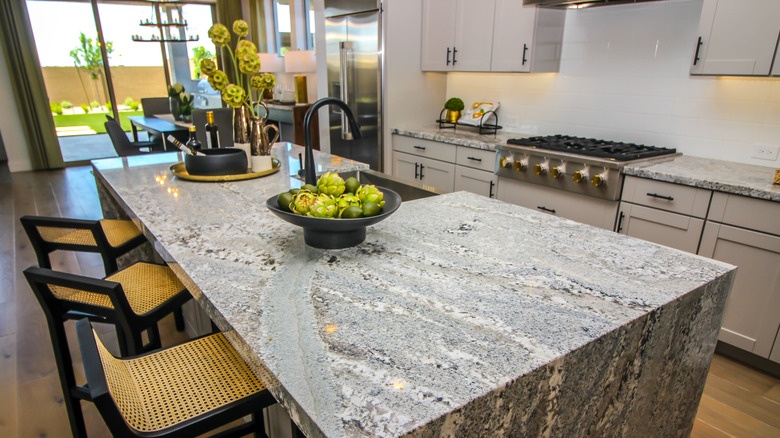 granite countertop in white kitchen