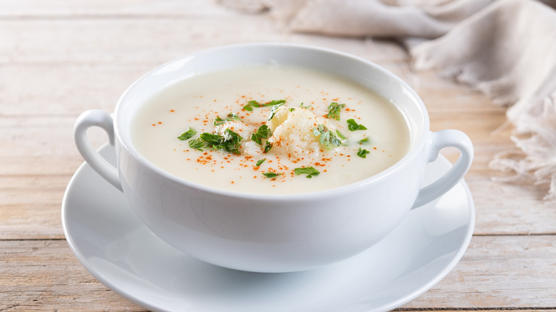 white bowl of cauliflower soup