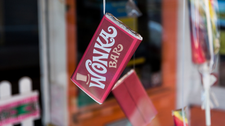 Classic Wonka chocolate bar hung from a ribbon