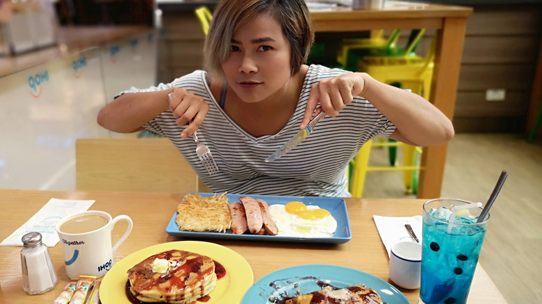 woman enjoys breakfast at IHOP