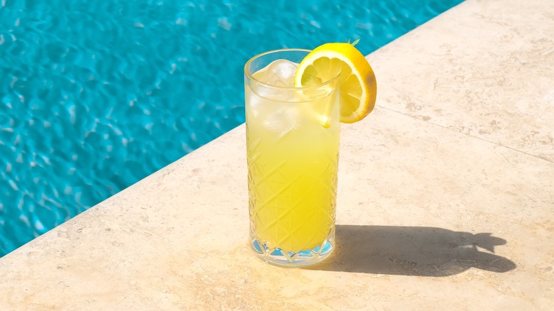 glass of lemonade by the pool