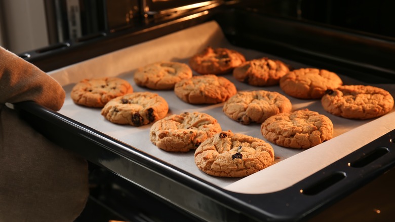 Cookie tray coming out of oven 