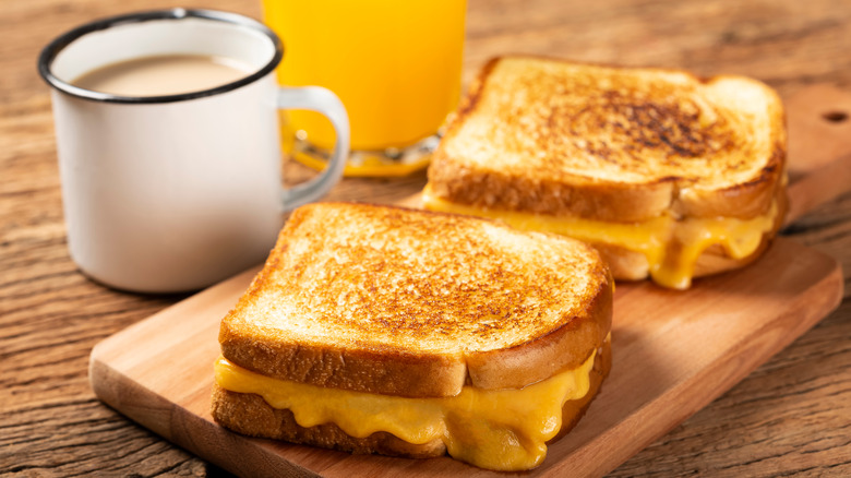 Grilled cheese sandwich and a cup of coffee
