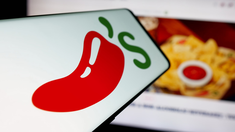 Chili's logo in front of menu