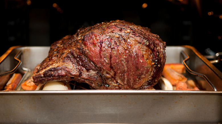 Prime rib roasting in the oven, uncovered