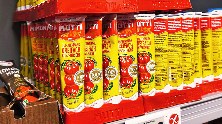 Yellow tubes of Mutti brand tomato ketchup on sale in Germany