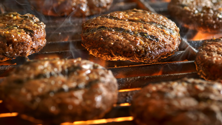 burger patties on a grill