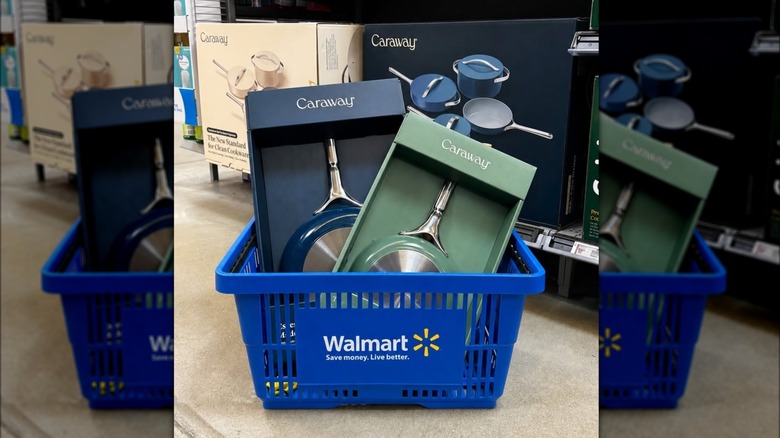 Caraway pans in a Walmart shopping basket with other Caraway products in the background