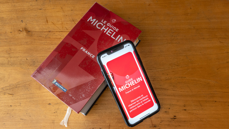 french michelin guides on table