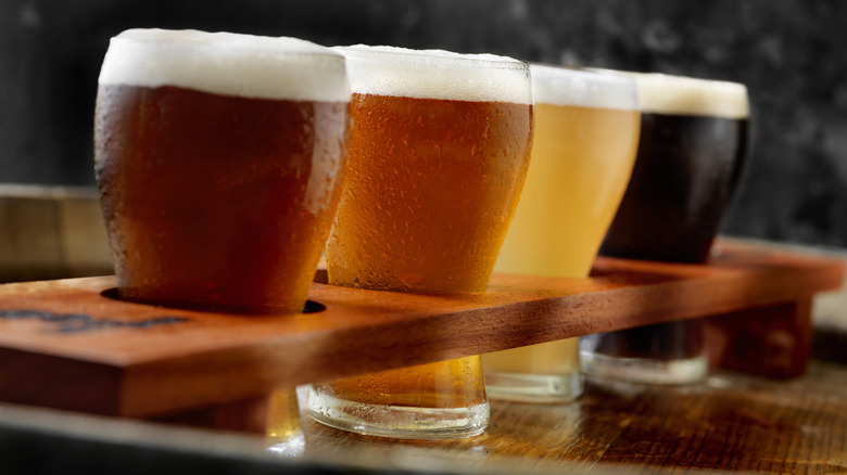 A selection of beers including red, hazy, and dark.
