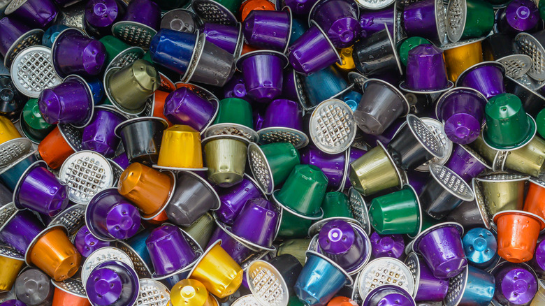 pile of used Nespresso capsules