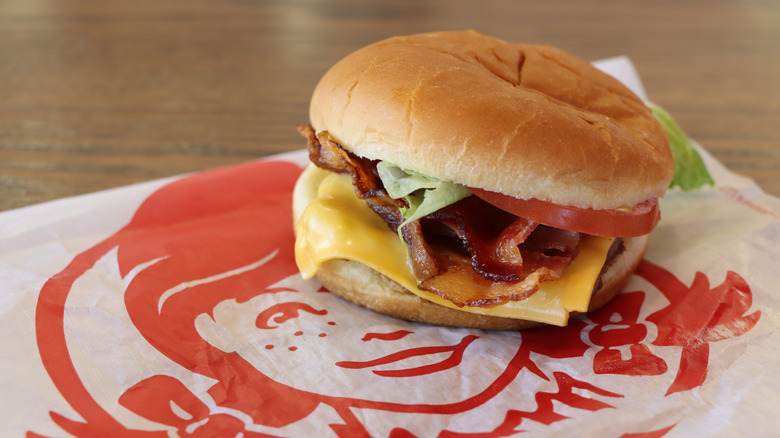 wendy's burger wrapper logo with bacon cheeseburger