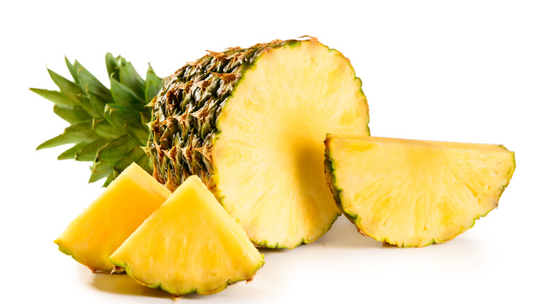 partially sliced pineapple