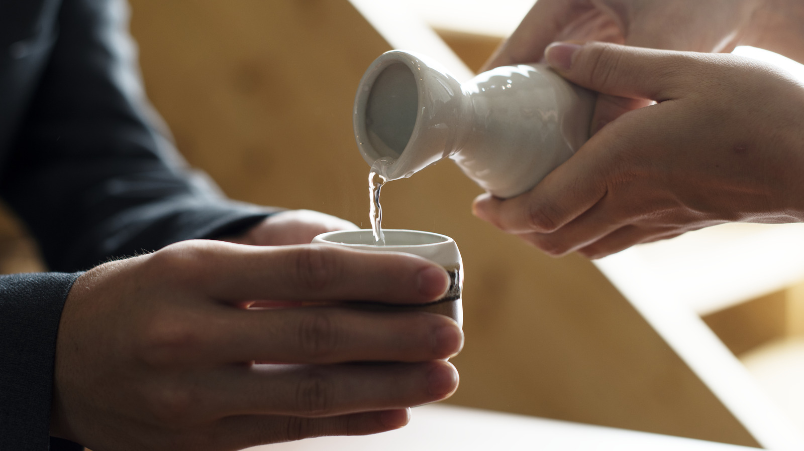 Why Pouring Etiquette Matters When Drinking Sake