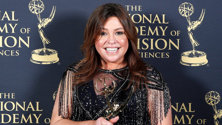 Rachael Ray holding her 2019 Daytime Emmy award which she received for The Rachael Ray Show