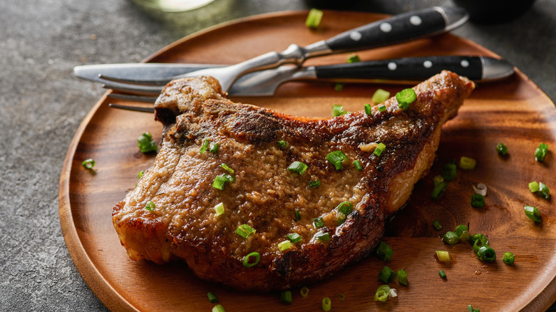 Grilled pork chop on a plate