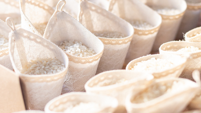 A basket of small rice bags at a wedding