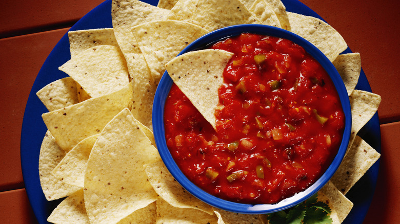 chips and salsa in blue dishes