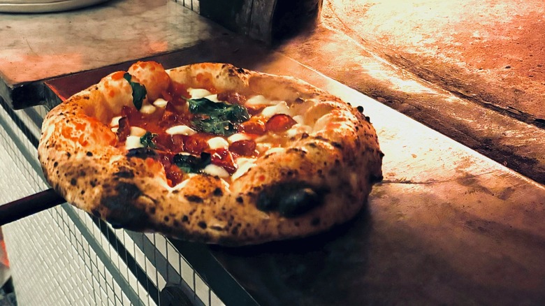 Freshly cooked Neapolitan margherita pizza
