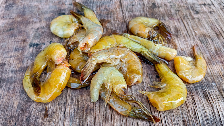 spoiled shrimp on wood