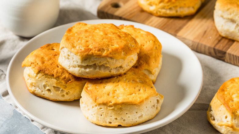 Closeup of homemade Southern biscuits stacked on a plate