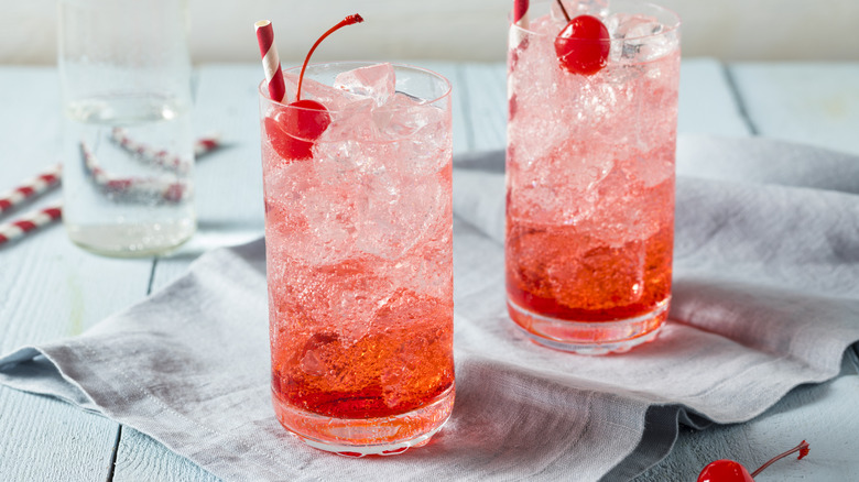 Shirley Temple drinks in glasses with straws