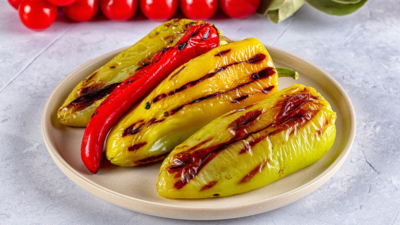 charred peppers on plate