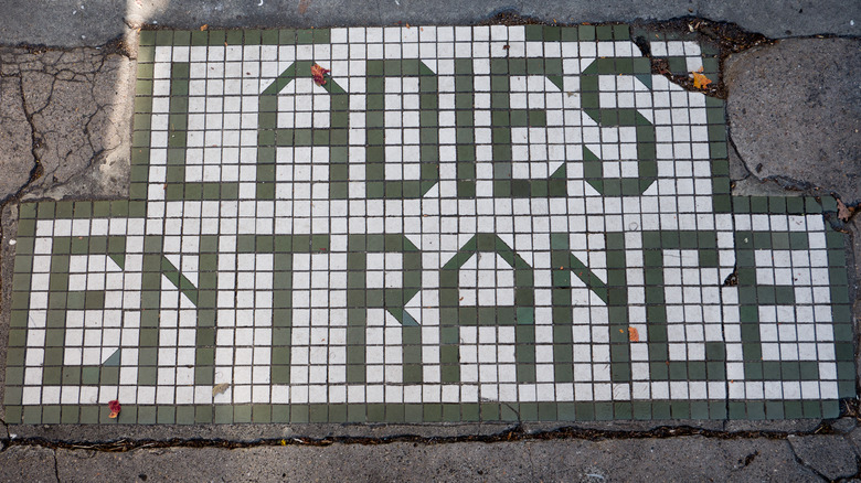 ladies entrance sign