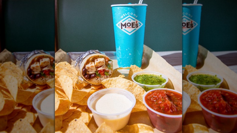 Moe's SkyWest Grill burrito meal with chips and drink