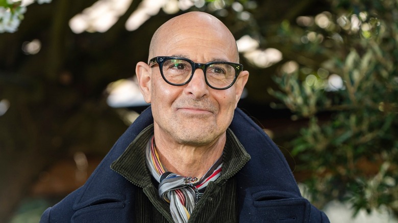 Stanley Tucci under trees
