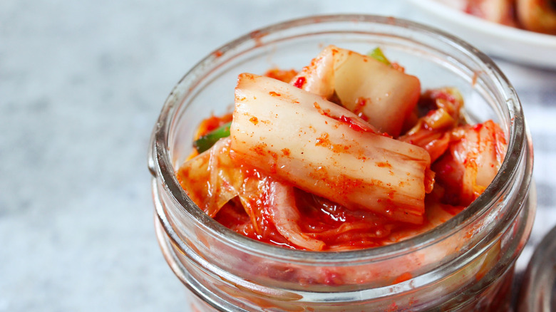 close up of open jar of kimchi