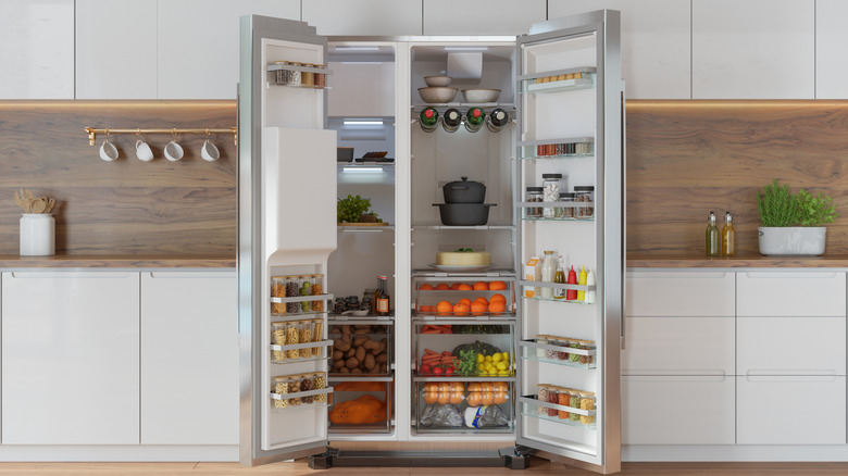 Open refrigerator in kitchen