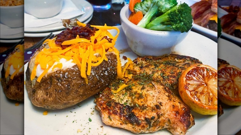 Texas Roadhouse herb crusted chicken dish with broccoli and potato