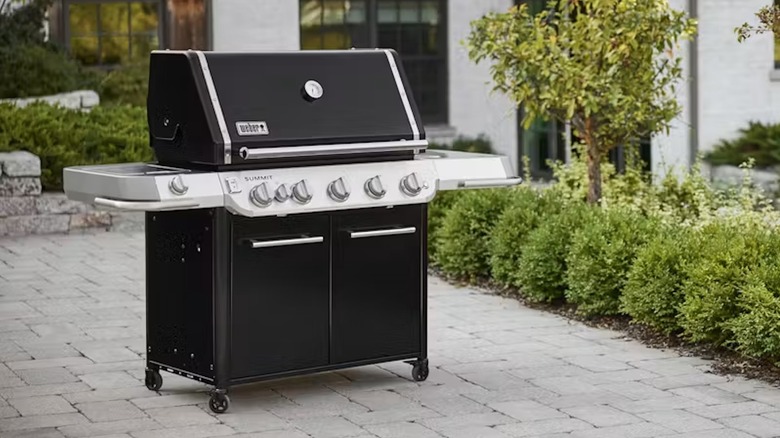 Weber Summit grill outside of home
