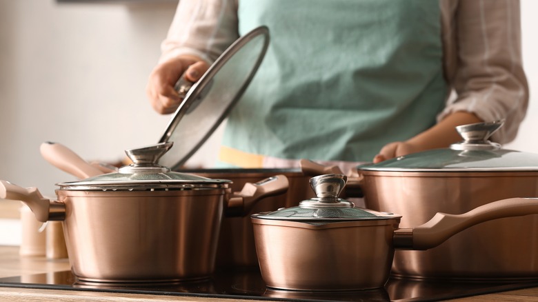 Home cook with copper pots