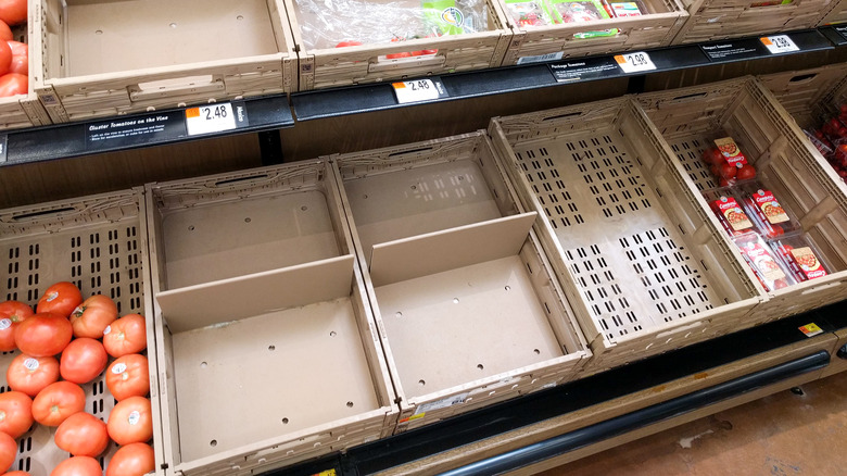 empty supermarket produce bins