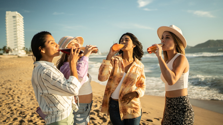 group of women drinking soda