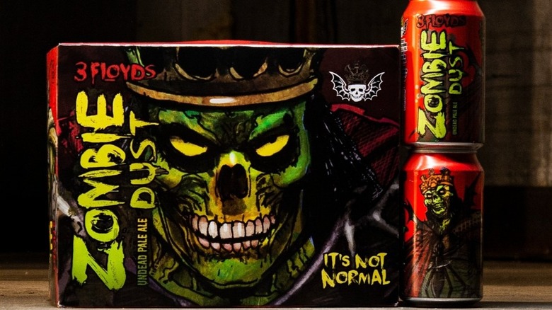 zombie dust cans and box packaging featuring scary zombie artwork